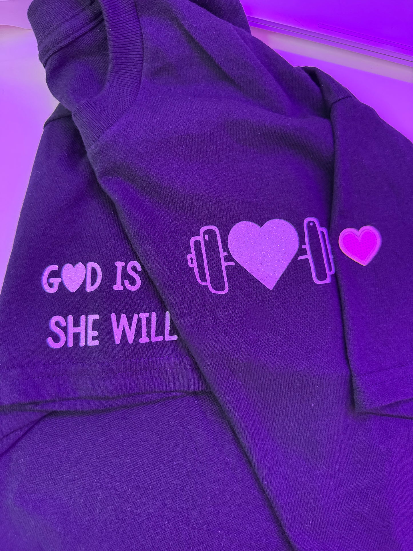 God is within her T-shirt